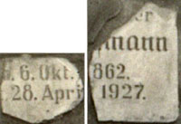 Zwei Fragmente des zerstörten Grabsteins von Moses Kaufmann, heute im Ehrenmal des Friedhofs  